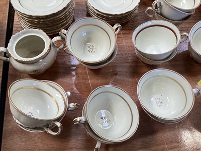 Lot 5112 - Rorstrand Swedish cream and gilt tea set, the rims with raised scroll pattern, comprising three teapots, two sugar bowls and one cover, 11 side plates, 15 saucers, and 21 cups