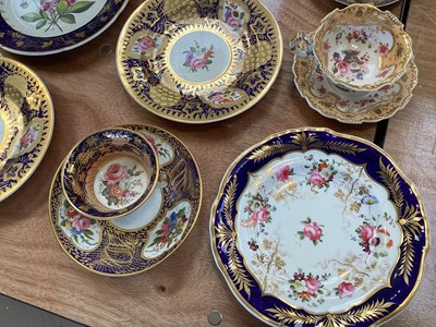 Lot 5109 - Group of English Regency floral painted porcelain, including a pair of square Spode dishes, a pair of Spode plates with gilt grapevines, H&R Daniel cup and saucer, etc