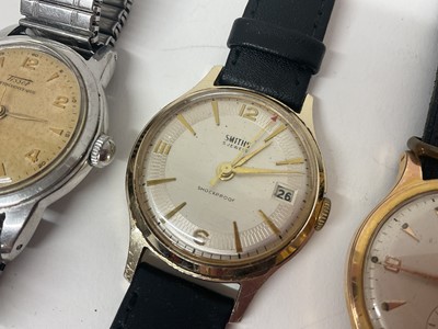 Lot 89 - Three vintage wristwatches to include Tissot 'Antimagentique' stainless steel watch on an expandable bracelet, Roamer and Smiths watches both in gold plated cases with stainless steel backs on b...