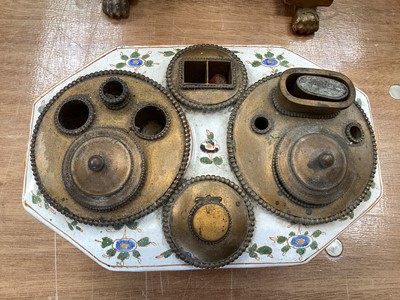Lot 5108 - 19th century faience inkstand, with lion mask handles, polychrome painted with floral swags, with brass fittings to the top, marked to base, 21cm across