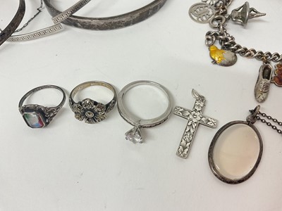 Lot 90 - Silver charm bracelet, silver bangles, silver rings etc