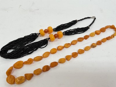 Lot 91 - Vintage amber and coral necklaces and some simulated pearls etc