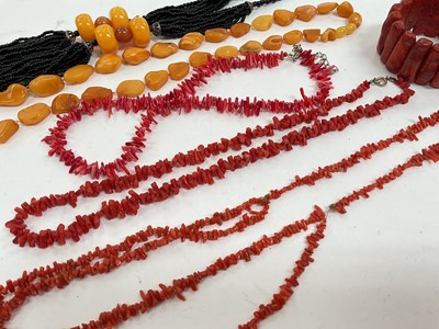 Lot 91 - Vintage amber and coral necklaces and some simulated pearls etc