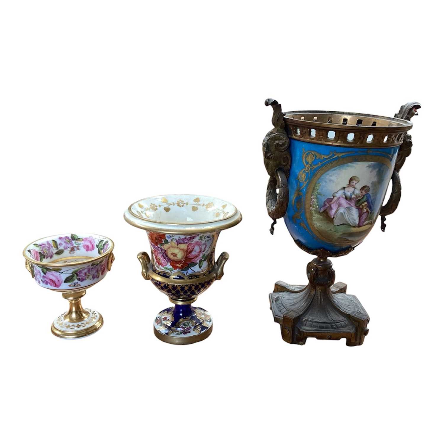 Lot 5111 - Sèvres style ormolu mounted porcelain vase, painted with panels containing figures and flowers, on a bleu celeste ground, with ram's heads and wreath handles, together with two smaller 19th cent...