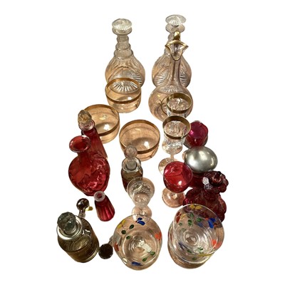 Lot 5120 - Group of mostly antique glassware, including a Bohemian flash cut glass bottle and stopper, pair of three ring decanters, continental gilt glass jug and finger bowls, cranberry glass, etc