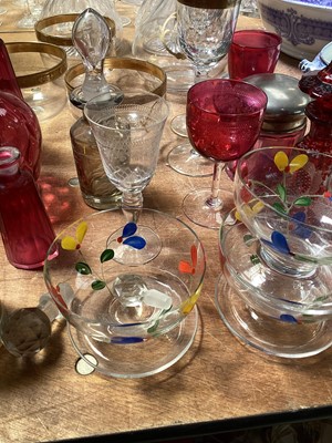 Lot 5120 - Group of mostly antique glassware, including a Bohemian flash cut glass bottle and stopper, pair of three ring decanters, continental gilt glass jug and finger bowls, cranberry glass, etc