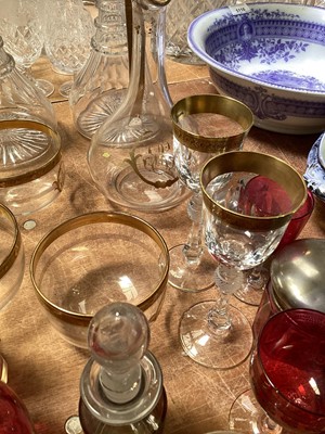 Lot 5120 - Group of mostly antique glassware, including a Bohemian flash cut glass bottle and stopper, pair of three ring decanters, continental gilt glass jug and finger bowls, cranberry glass, etc