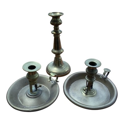 Lot 5117 - Pair of brass ejector candlesticks, one with mark for H. Loveridge & Co, Wolverhampton, and another brass candlestick (3)