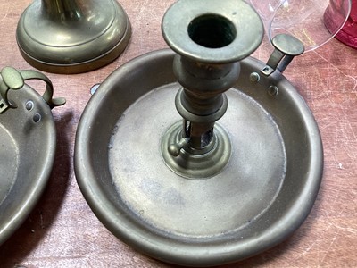 Lot 5117 - Pair of brass ejector candlesticks, one with mark for H. Loveridge & Co, Wolverhampton, and another brass candlestick (3)