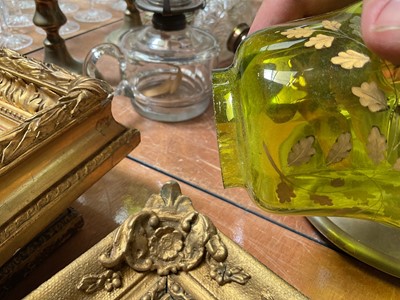 Lot 5119 - Three antique oil lamps with coloured glass shades, two of the burners by Gaudard France, and the other Kosmos, each approx 40cm high excluding chimneys, together with other oil lamp parts