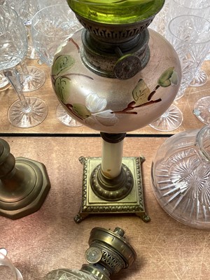 Lot 5119 - Three antique oil lamps with coloured glass shades, two of the burners by Gaudard France, and the other Kosmos, each approx 40cm high excluding chimneys, together with other oil lamp parts