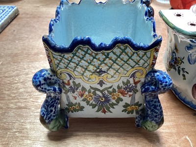 Lot 5125 - Pair of antique French faience wall mounted bough pots, polychrome painted with flowers, marked 'VP' for Veuve Perrin, 16cm across, together with a small faience planter with dolphin supports (3...