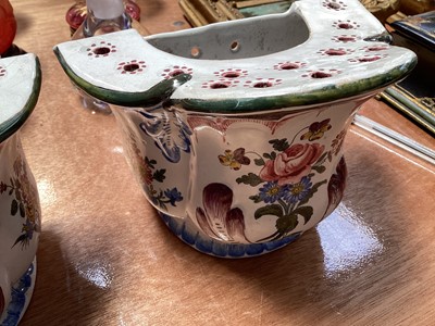 Lot 5125 - Pair of antique French faience wall mounted bough pots, polychrome painted with flowers, marked 'VP' for Veuve Perrin, 16cm across, together with a small faience planter with dolphin supports (3...