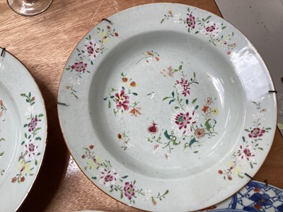 Lot 5130 - Set of three 18th century Chinese Imari porcelain plates, and two famille rose dishes (5)