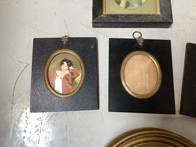 Lot 5134 - Three antique black lacquered portrait miniature frames, and two other frames, with prints