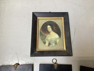 Lot 5134 - Three antique black lacquered portrait miniature frames, and two other frames, with prints