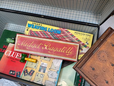 Lot 5221 - Large trunk containing toys and games, including Bagatelle, Weaving Loom, clockwork tin frog, etc