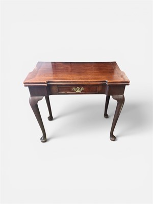 Lot 1513 - George II mahogany tea table with fold over top, gateleg support, the shaped frieze with single drawer and original brass handle, on cabriole legs with pad feet, 81cm wide x 40cm deep x 74cm hig...