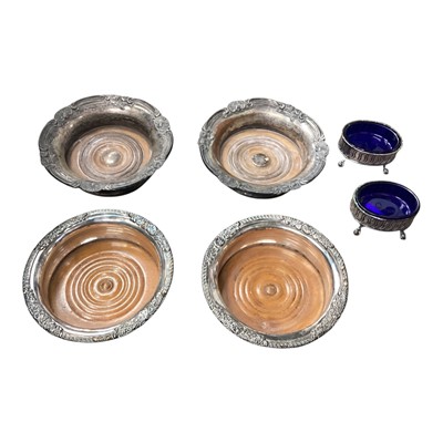 Lot 104 - Two pairs of 19th century wine coasters and early pair of plated salts