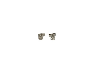 Lot 171 - Pair of diamond single stone earrings