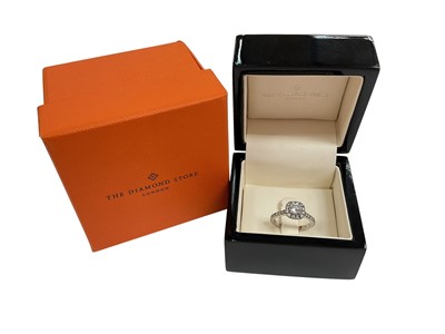 Lot 5 - Lab Grown Diamond Halo cluster ring with a central round brilliant cut Lab Grown diamond weighing 0.52ct, E colour and VVS2 clarity, surrounded by a border of further Lab Grown diamonds with fur...