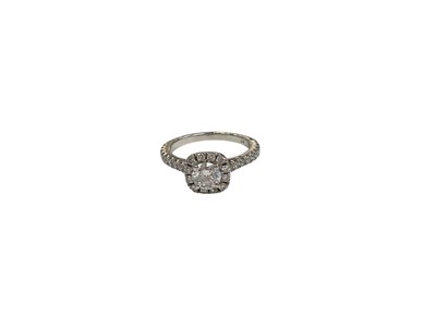 Lot 5 - Lab Grown Diamond Halo cluster ring with a central round brilliant cut Lab Grown diamond weighing 0.52ct, E colour and VVS2 clarity, surrounded by a border of further Lab Grown diamonds with fur...