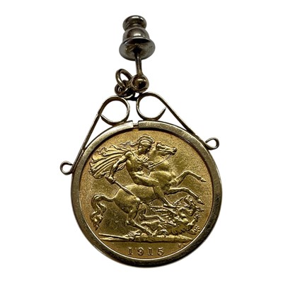 Lot 403 - G.B. - Gold ½ Sovereign George V 1915 GF (N.B. Set in yellow metal pendant earring mount, unhallmarked, total Wt. 5.3gms) (1 coin)
