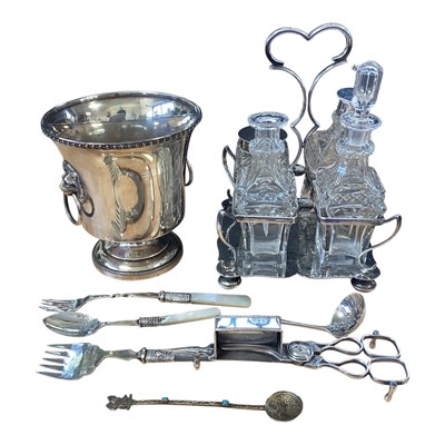 Lot 5003 - Silver plated wine cooler with lion mask and ring handles, an Art Nouveau silver plated four bottle cruet, and a small group of other plated ware