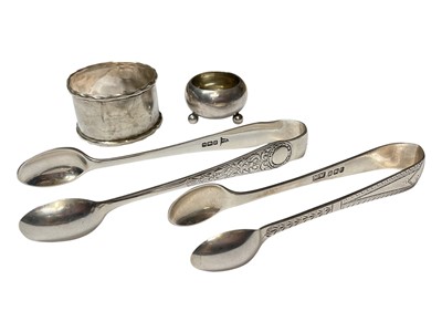 Lot 170 - Two pairs of antique silver sugar tongs (Sheffield 1898 and 1906), Victorian silver salt (Sheffield 1882) and a silver napkin ring