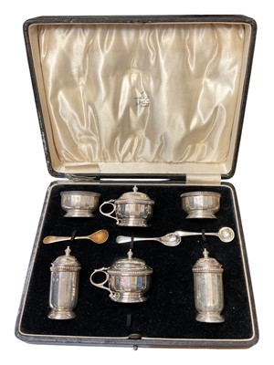 Lot 93 - Late 1920s silver six piece cruet set in a fitted case