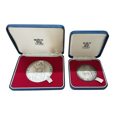 Lot 609 - G.B. - Royal Mint Silver Jubilee Elizabeth II 1977 commemorative medallions (N.B. Obv: Elizabeth II enthroned with sceptres, cased, Est. total Wt. 140 gms) (2 medallions)