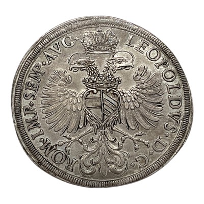 Lot 617 - German State - Regensburg silver Thaler 1694MF GEF Obv: Legend: LEOPOLDVS . D. G. ROM. IMP. SEMP. AVG (N.B. Eagle with heart-shaped Austrian Arms on breast) (Rev: Arms in frame, M.F. below) (1 c...