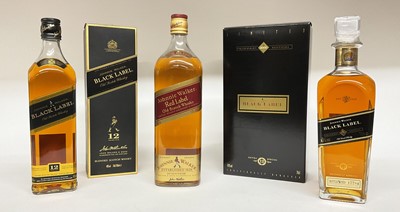 Lot 26 - Three bottles, Johnnie Walker Black Label Millenium Edition, bottle no. 17794, 40%., 70cl., in original box, together with Black and Red Label bottles, one boxed (3)