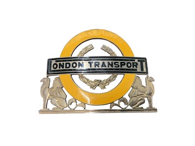 Lot 1960s silver and enamel London Transport badge, with central laurel wreath, (Birmingham 1967), maker William James Dingley, 7cm in width.