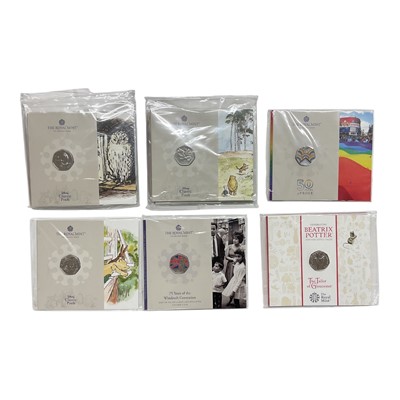 Lot 442 - G.B. - Royal Mint brilliant UNC flatpack 50p coins to include Classic Pooh, Harry Potter, Gruffalo, The Snowman (N.B. Some coloured) & others (46 coins)