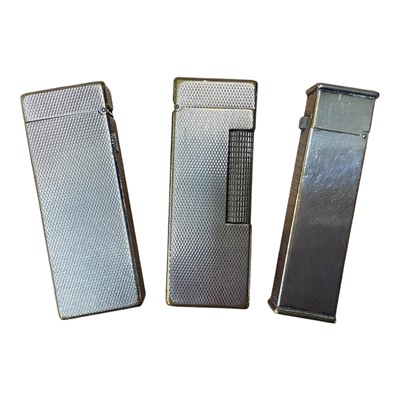 Lot 5006 - Three silver plated Dunhill lighters