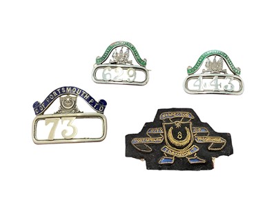 Lot Two vintage Southend Corporation enamel transport badges, together with a City of Portsmouth enamel transport badge and a similar bullion thread badge, (4).