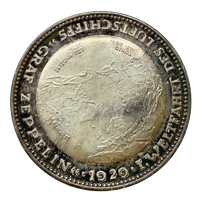 Lot 637 - Germany - A .900 silver medallion commemorating The Graf Zeppelin First Flight Around The World 1929 (Dia: 35mm) (1 medallion)