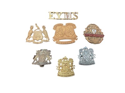 Lot Group of seven various transport badges to include a scarce Stockton and Thornaby Corporation Tramways Conductors cap badge, two Bolton Corporation badges and a 15 year Long Service badge, (7)....