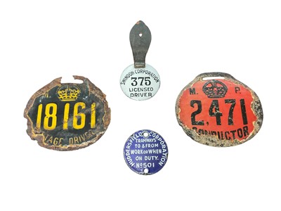 Lot Group of four transport badges comprising, Swindon Corporation Licensed Driver badge, Huddersfield Corporation Tramways badge, a Stage Driver badge and a Conductor badge (4).