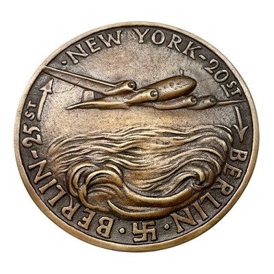 Lot 646 - Germany - A bronze medallion commemorating the First Non Stop Flight between Berlin and New York by plane, a Condor F.W 200 12th-14th Aug 1938 (Dia: 96mm) (1 medallion)