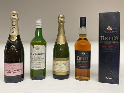 Lot 106 - Four bottles: Bell's Special Reserve Whisky, Black & White Whisky, Moët & Chandon Rose Imperial and another bottle of champagne