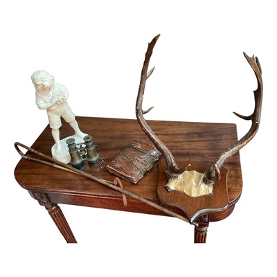 Lot 112 - Mounted pair of stag horns an alligator purse and binoculars, plaster figure, two canes