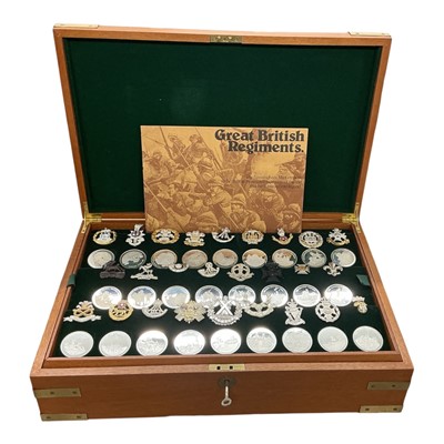 Lot 712 - Great British Regments silver badge and coin collection