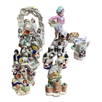 Lot 5061 - Collection of 19th century and reproduction Staffordshire figures including spill vases, spaniels etc