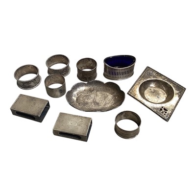 Lot 5197 - Group of silver, including two dishes, napkin rings, and two matchbox holders, approx 322.2 grams