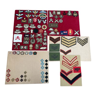 Lot 723 - Group of six boards, mounted with a selection British military cloth badges, (6).