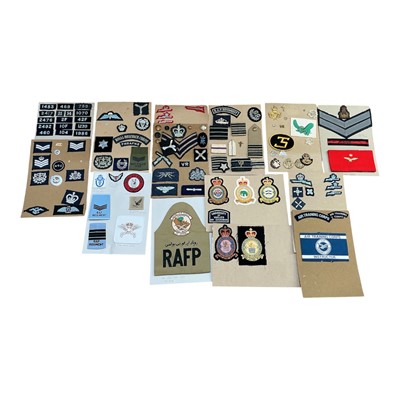 Lot 725 - Collection of RAF and related cloth military badges, mounted on boards, (1 box).