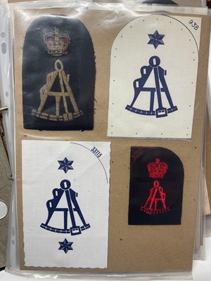 Lot 739 - Collection of mainly Royal Navy cloth badges, contained within a ring binder album.