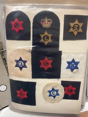 Lot 740 - Collection of mainly Royal Navy cloth badges, contained within a ring binder album.